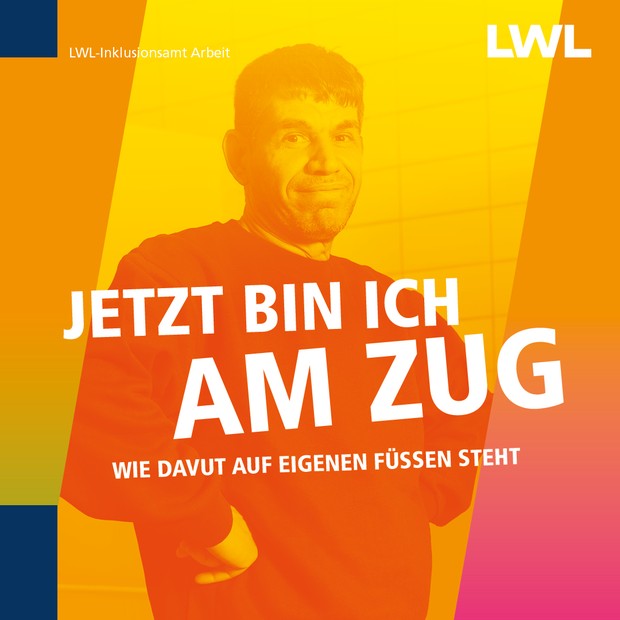 "Jetzt bin ich am Zug" Ein Mann im schwarzen Pulli lächelt in die Kamera.